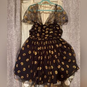 Unique Vintage Sheer Black Mini Dress with Gold Accents
